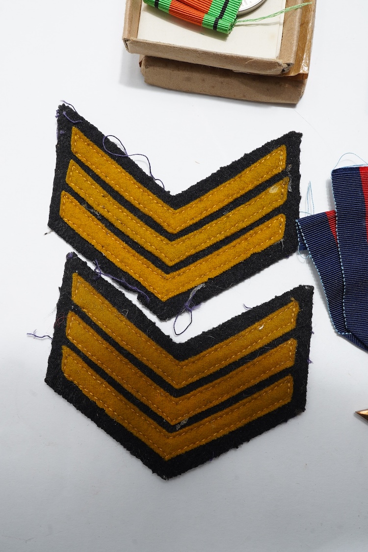 A First World War Mons Star trio awarded to Capt. A.D. Lowdell, with a clasp for 5th Aug-22nd Nov 1914, and oakleaf - mention in dispatches, together with the miniature set, plus a WWII Defence medal in its original card